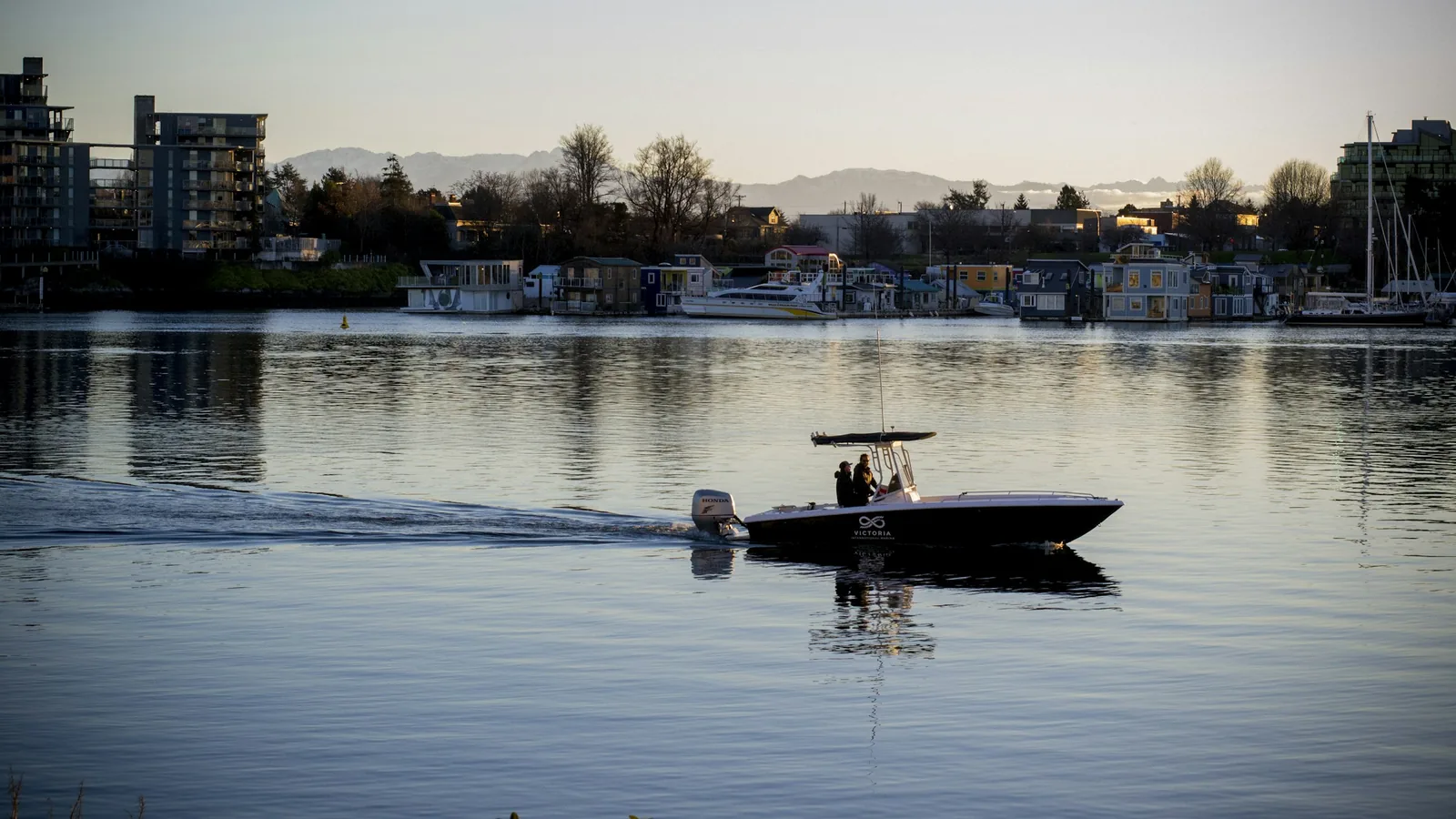 Float homes moored along a quiet BC inlet