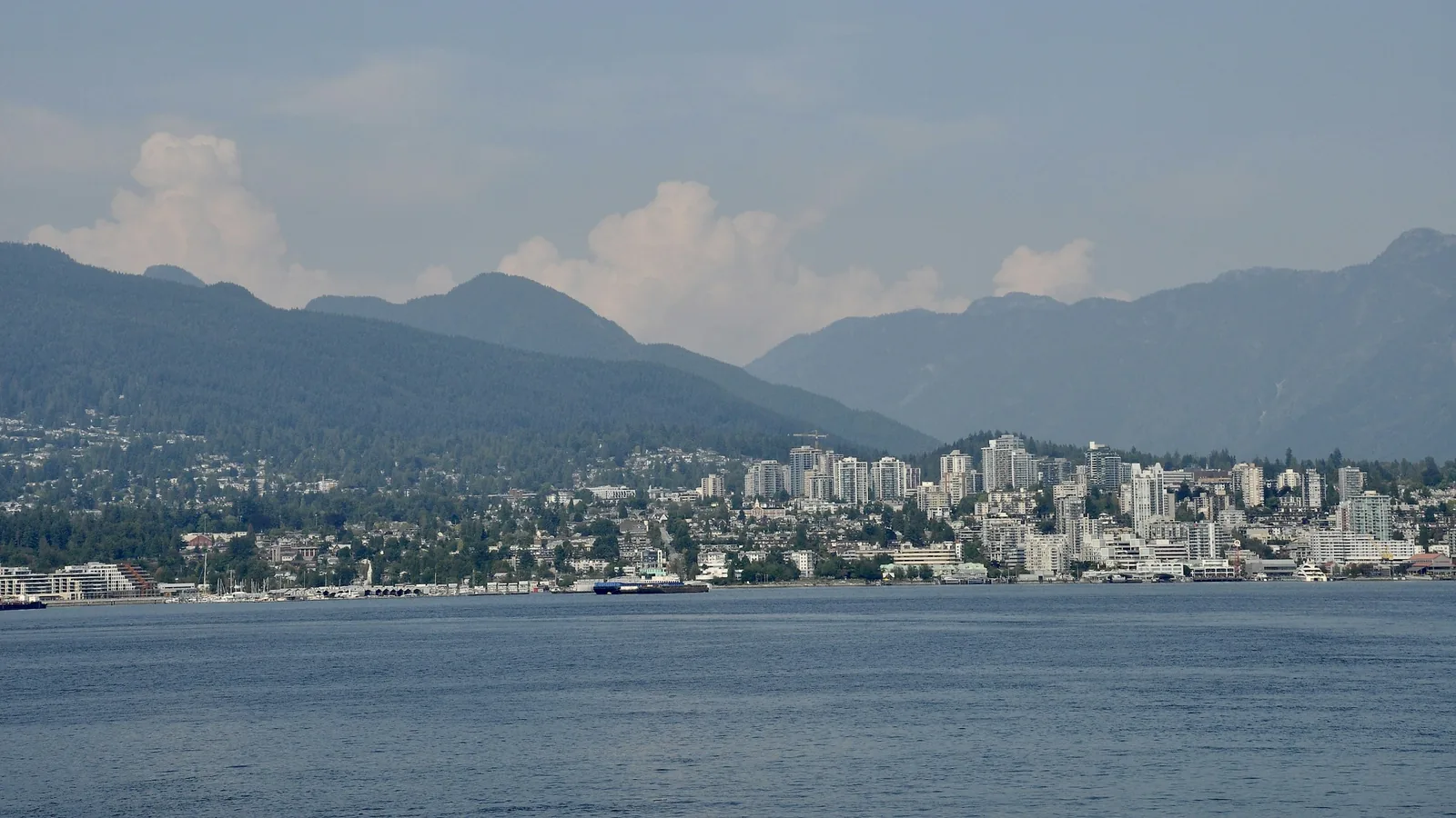 North Vancouver shoreline and mountains across Burrard Inlet