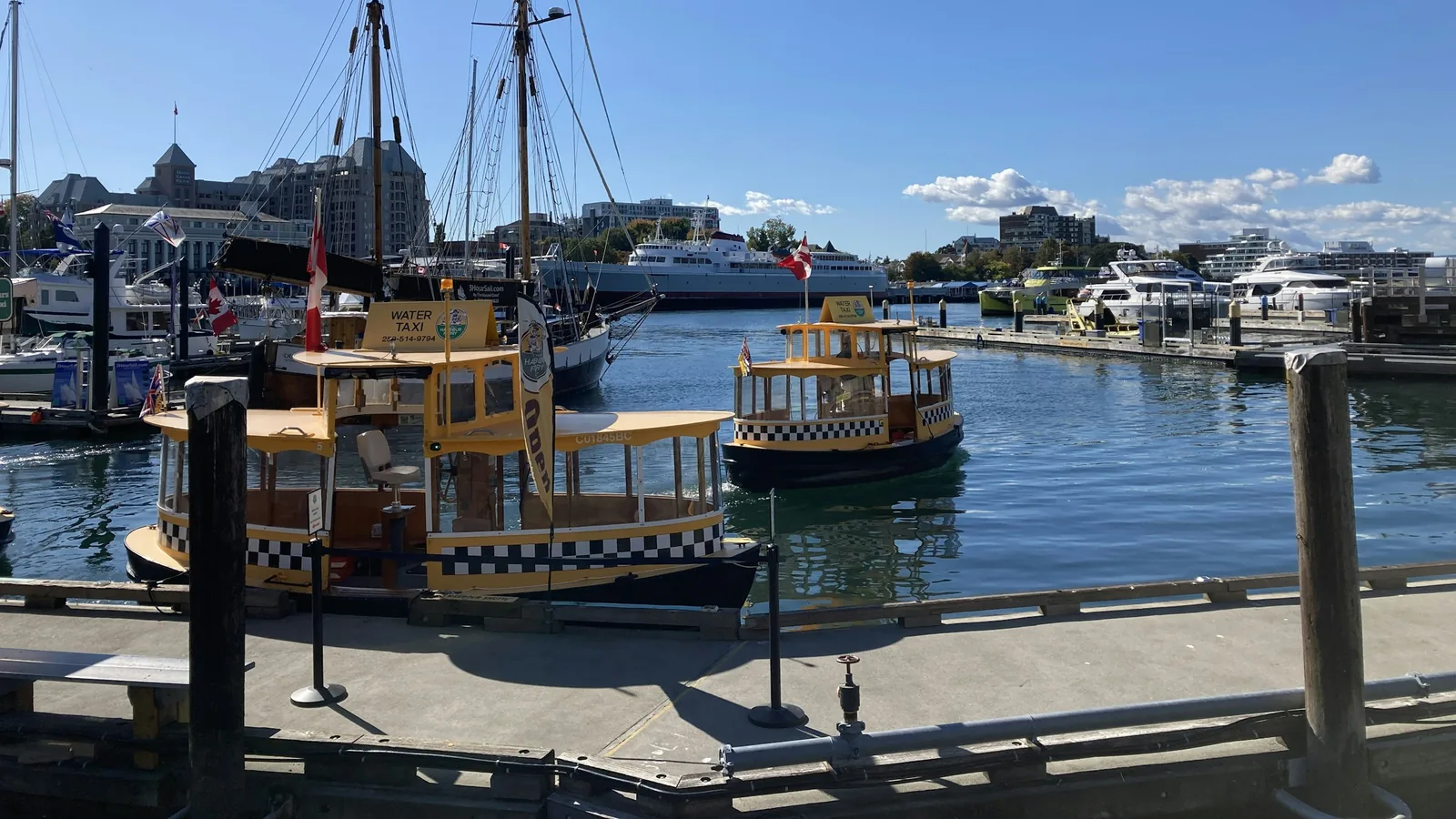 Boats in Victoria's Inner Harbour on a clear day