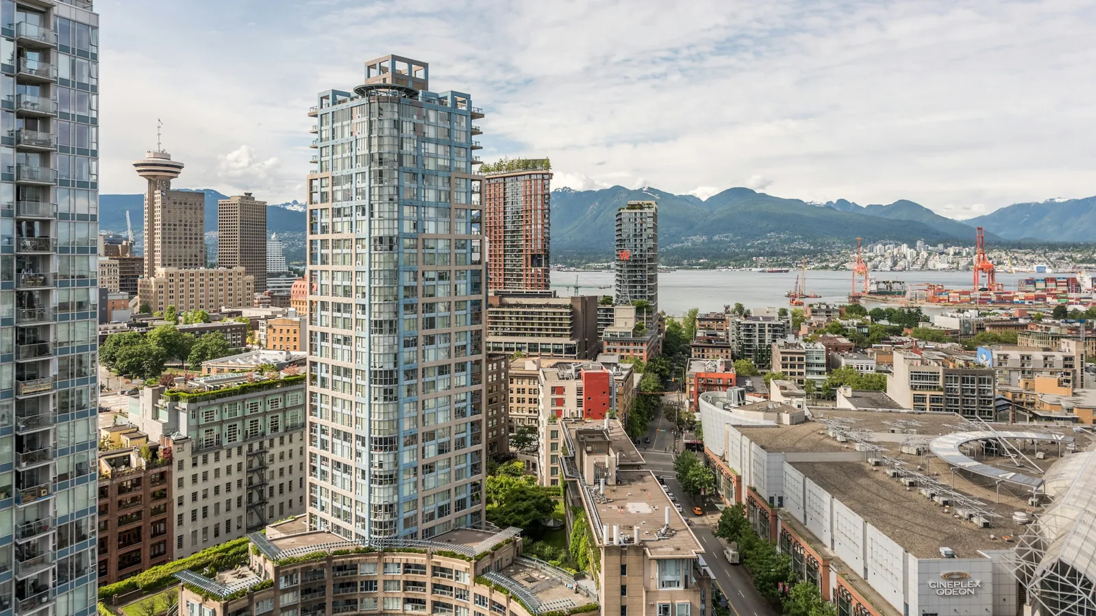 High rise buildings near body of water during daytime in Vancouver