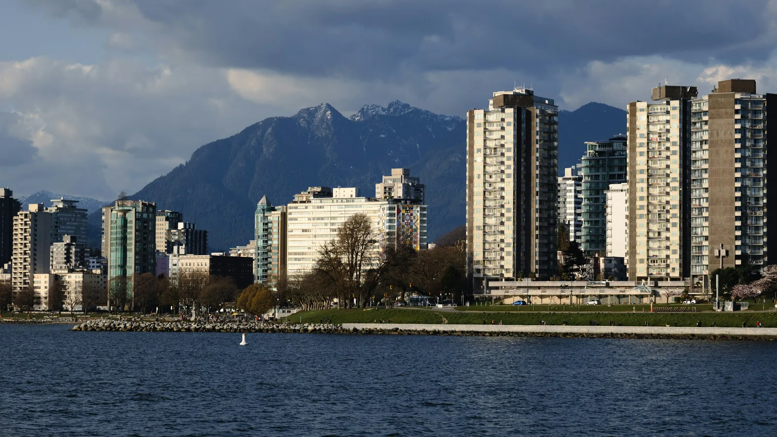 City skyline with mountains in the background in Vancouver