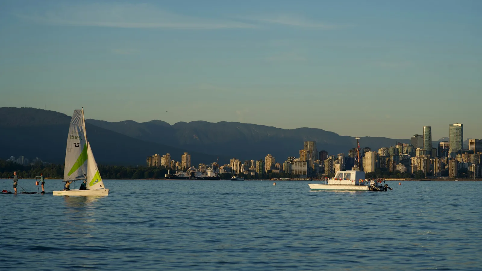 Sailboats on English Bay with the Vancouver skyline behind