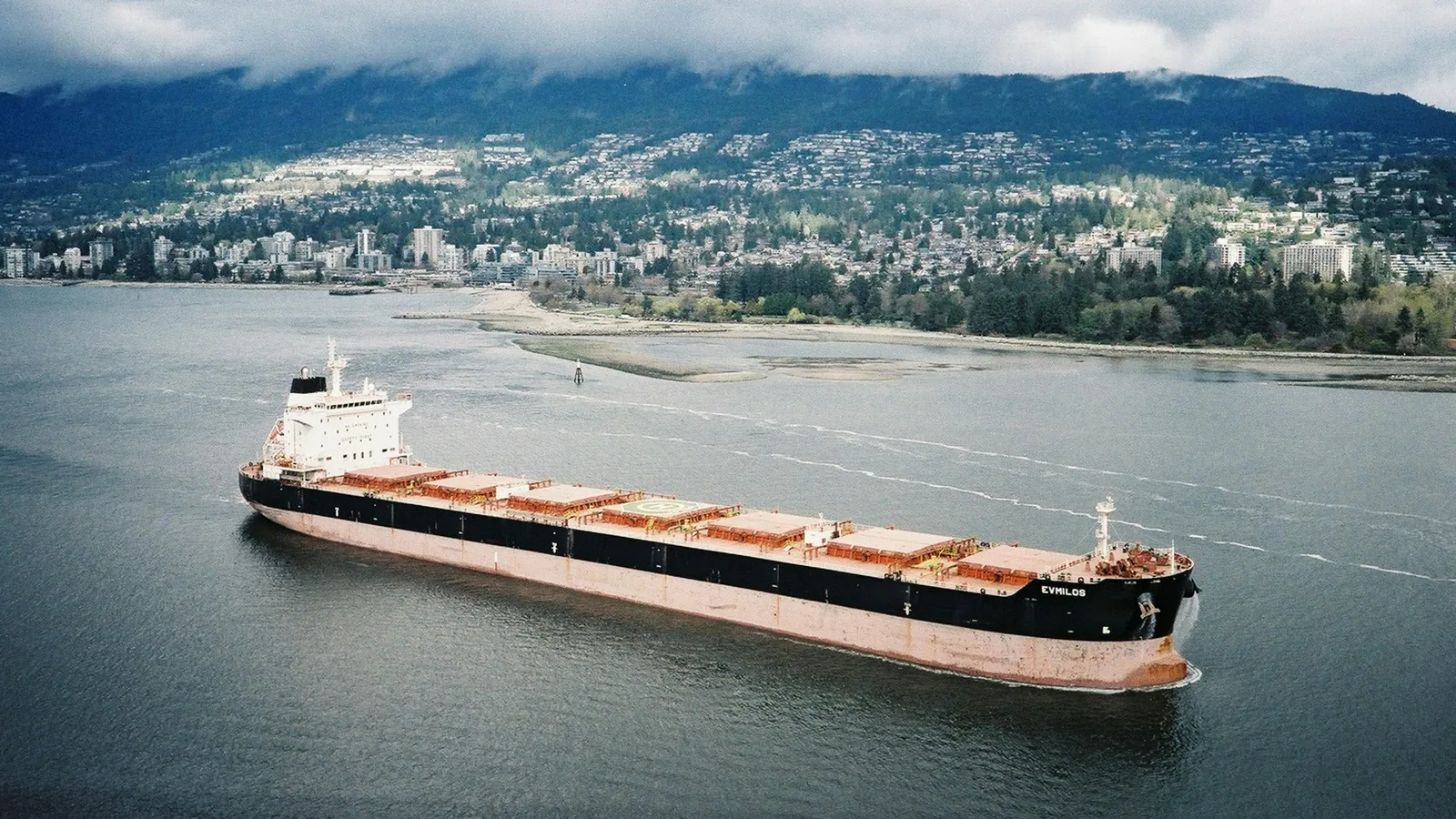 Cargo ship passing Vancouver’s skyline in Vancouver's North Shore