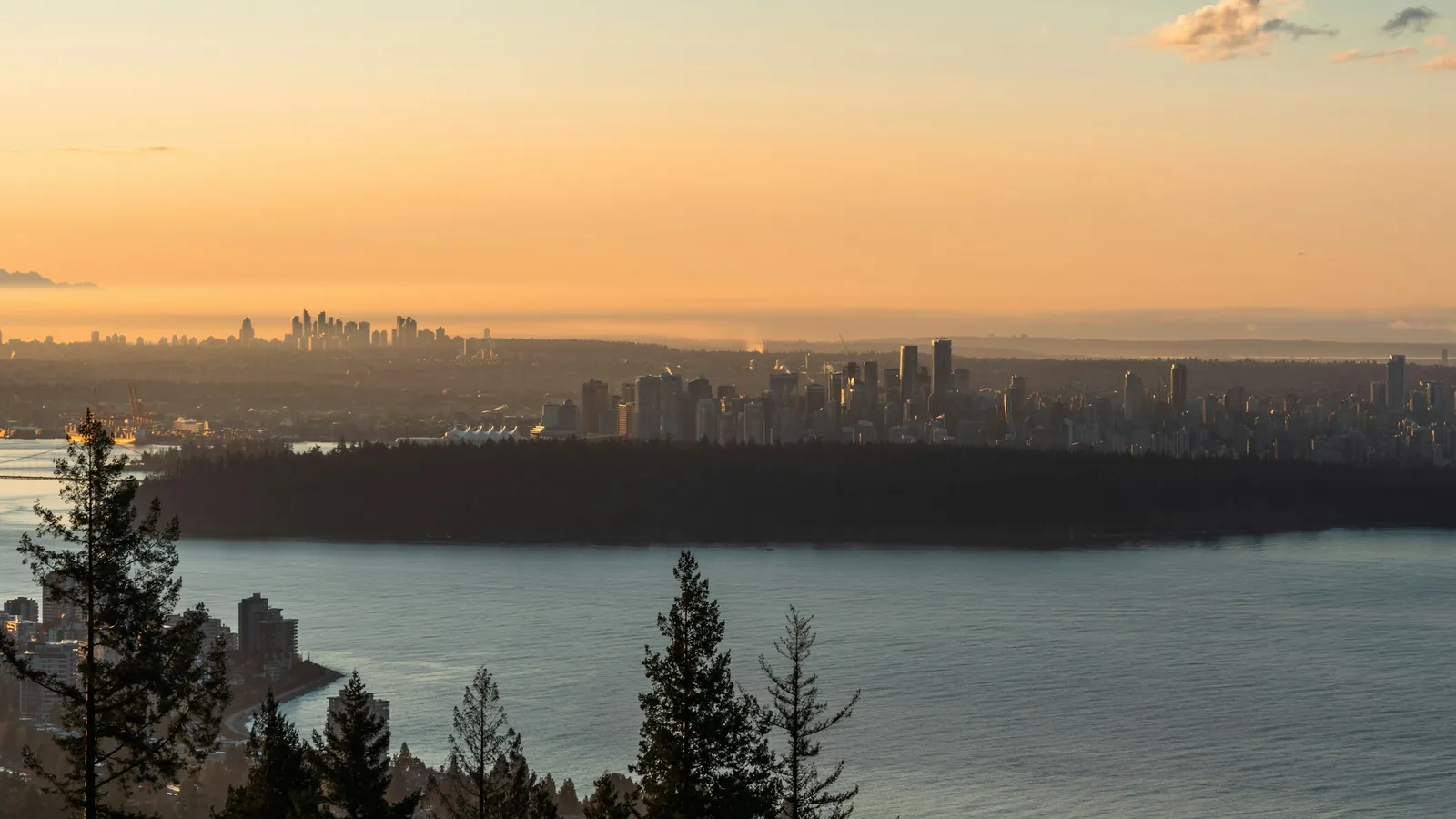 A large body of water with a city in the background, Vancouver's North Shore
