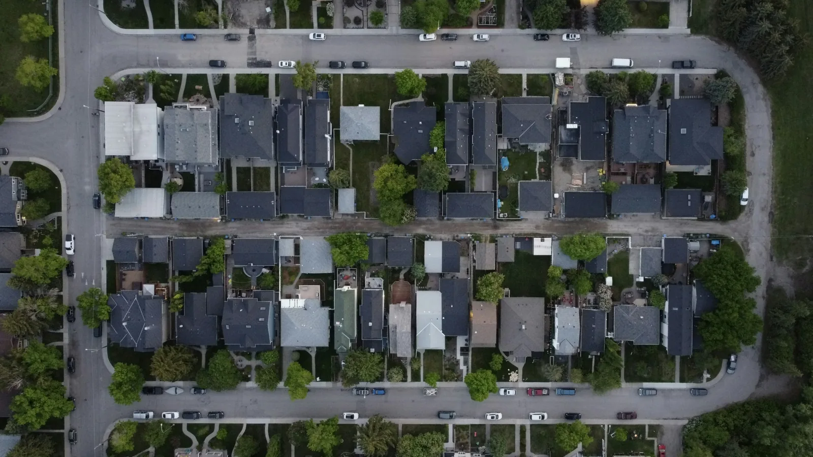 Aerial view straight down onto a grid of residential streets