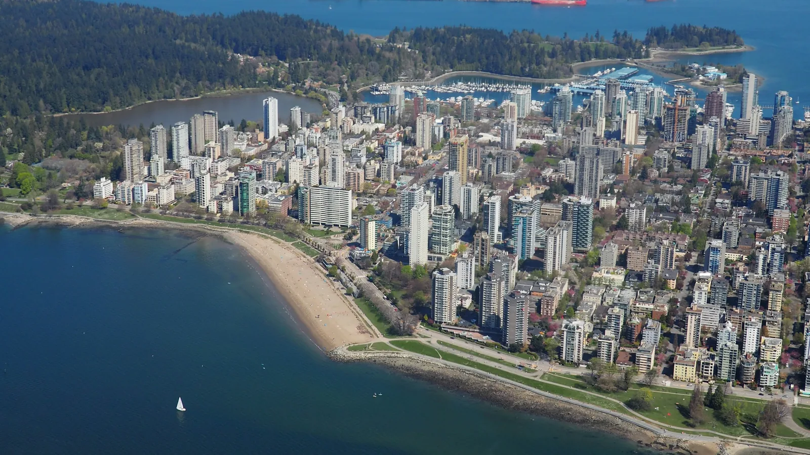 Aerial view of English Bay beach and the West End towers