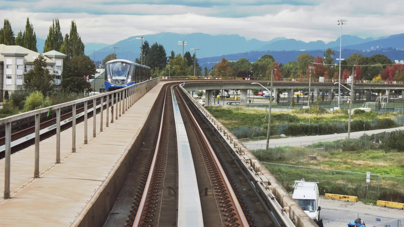 SkyTrain guideway in Surrey with the mountains in the distance
