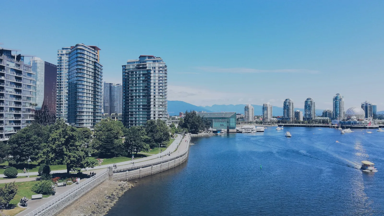 City skyline near body of water during daytime in Vancouver